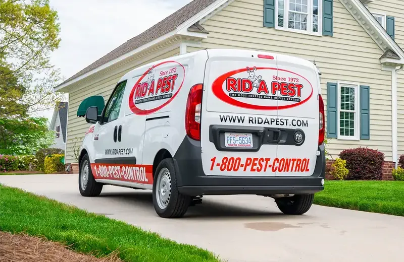 Rid a Pest van in driveway